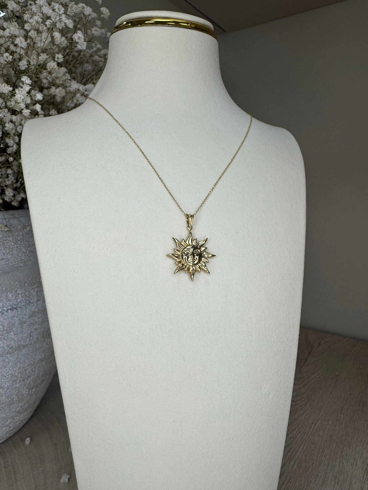 14k Gold chain with 10k gold sun pendant